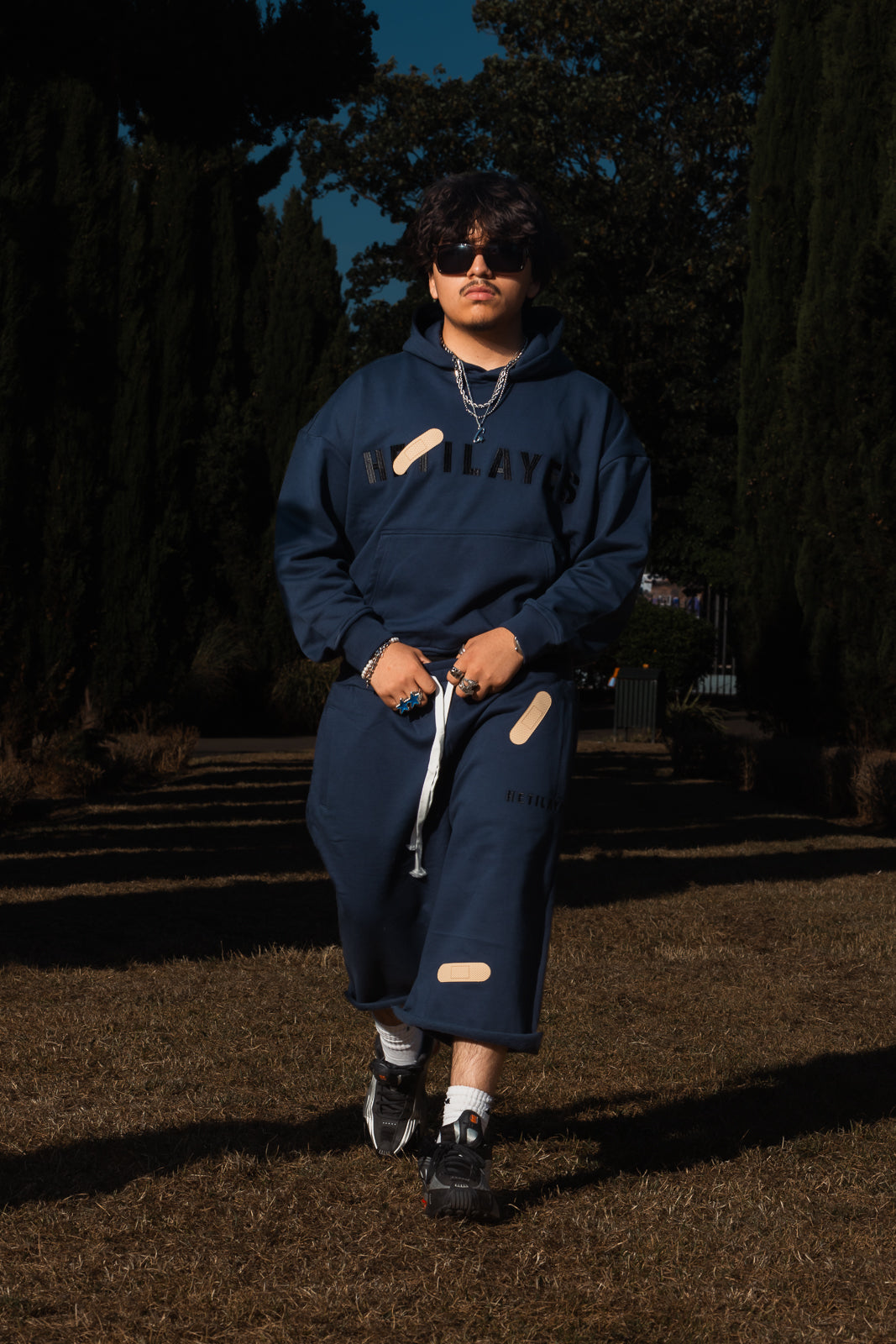 'Plaster track' Navy Hoodie